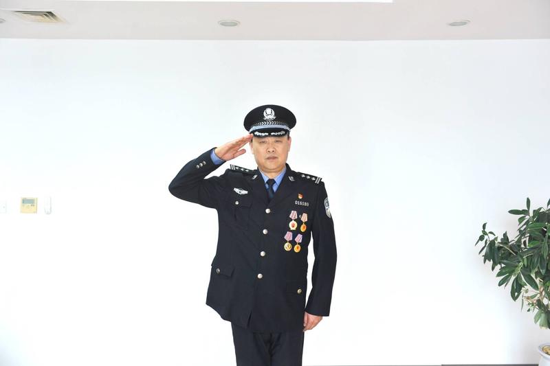 青岛市公安局刑警支队六大队副大队长王洪波
